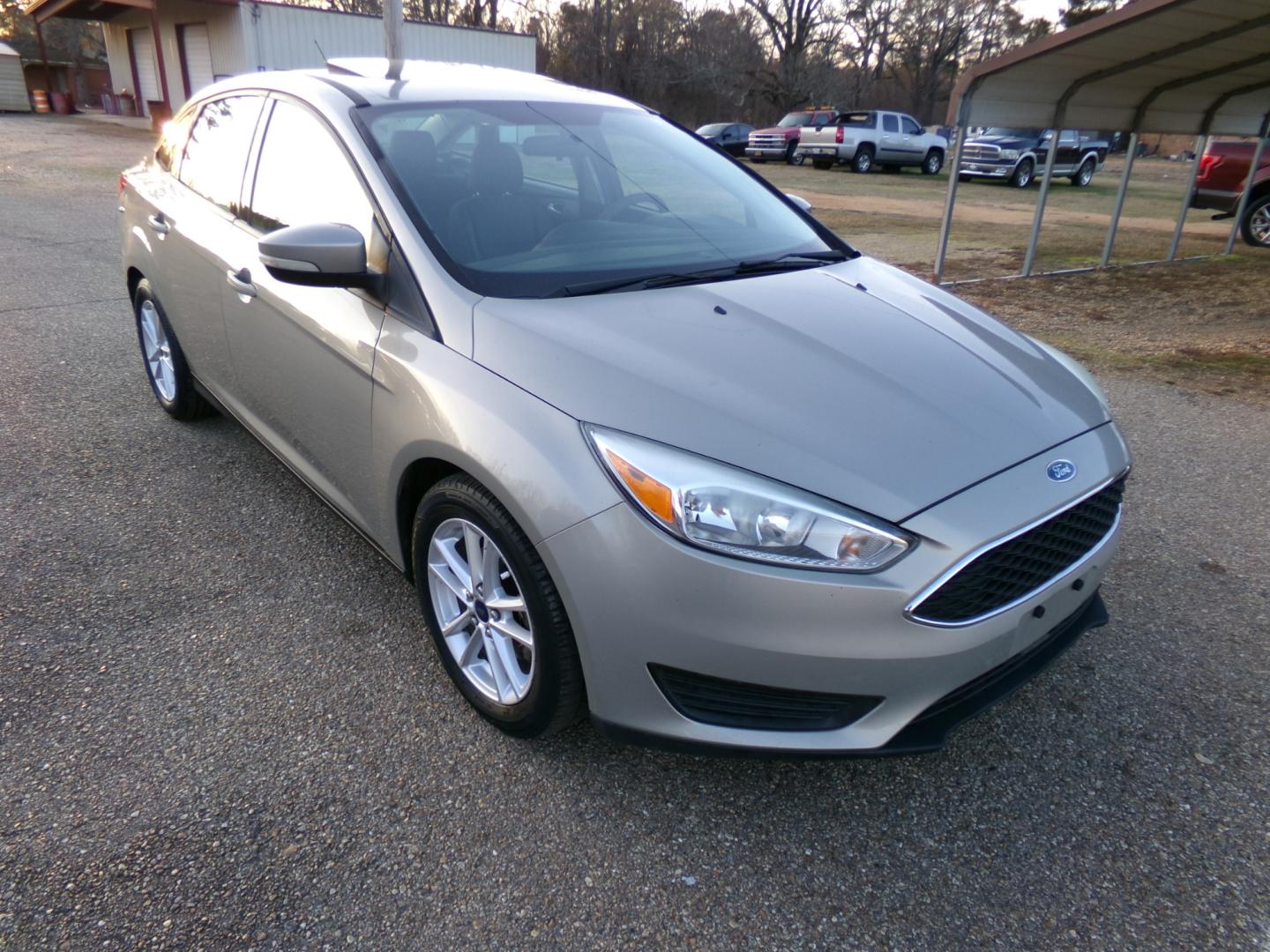 2015 Tectonic Silver Metallic /Black Ford Focus (1FADP3F23FL) , located at 401 First NE, Bearden, AR, 71720, (870) 687-3414, 33.726528, -92.611519 - Photo#23